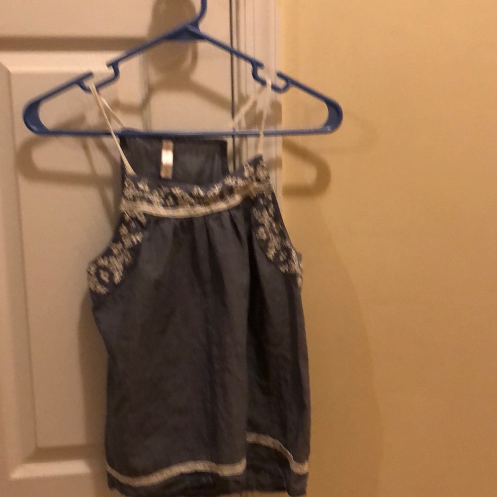 a blue tank top